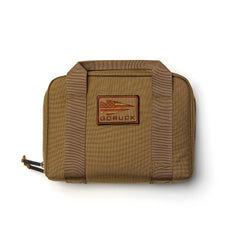 A tan GORUCK Pistol Rug made from rugged 1000D Cordura, featuring sturdy handles and a jet logo patch on the front.