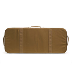The brown Rifle Case is rectangular with handles on the top and sides, photographed against a white background. Its modular design is compatible with hard cases.