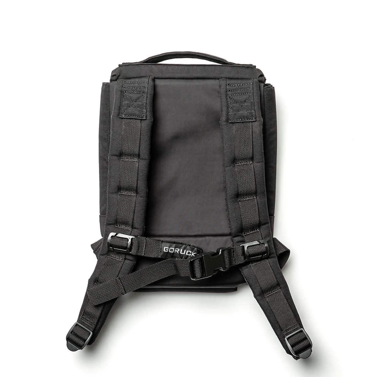 GORUCK black rucksack back view with padded straps and durable build on white background