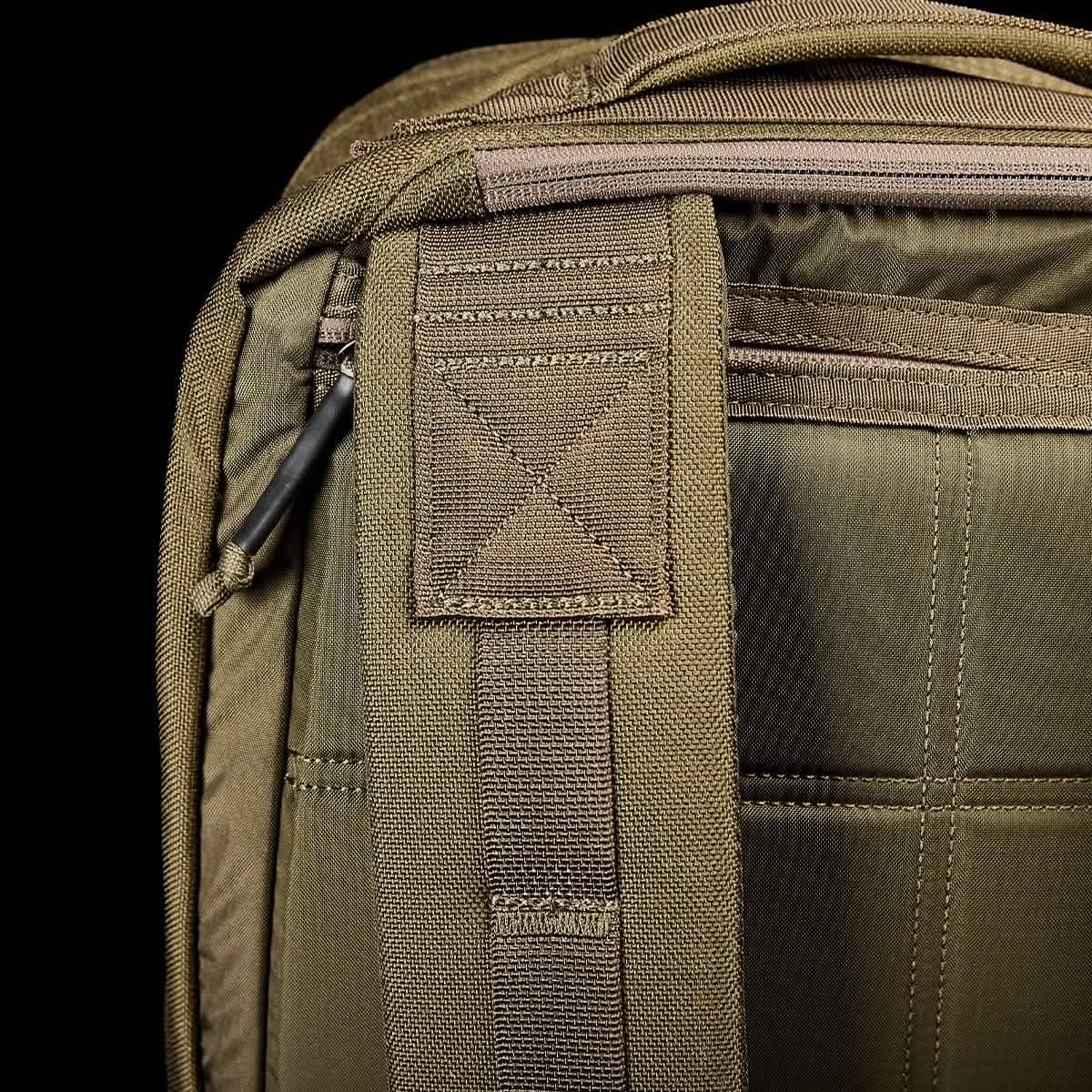 Close-up of GORUCK Ranger Green rucksack shoulder strap and stitching detail