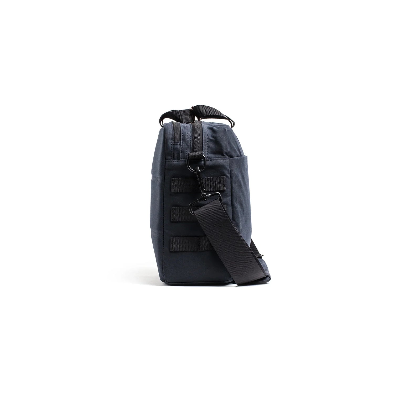 GORUCK Heritage black shoulder bag 15L side view with durable strap and MOLLE webbing