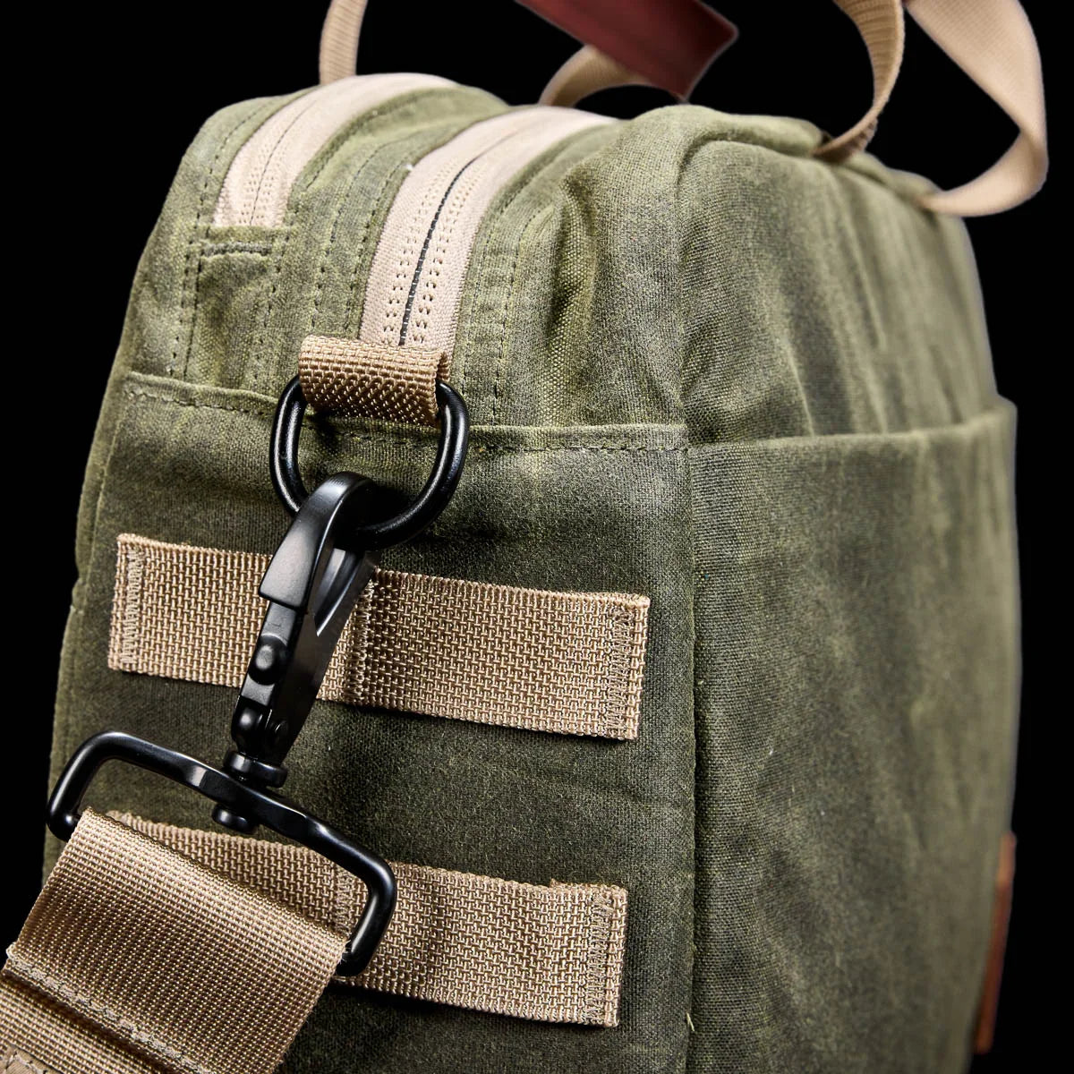 GORUCK olive waxed canvas shoulder bag with tan webbing and metal clasp detail