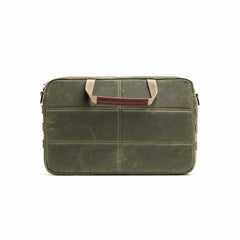 GORUCK olive waxed canvas shoulder bag with tan handle, front view on white background