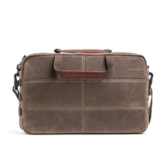 GORUCK dark oak waxed canvas shoulder bag with top handles and adjustable strap, back view