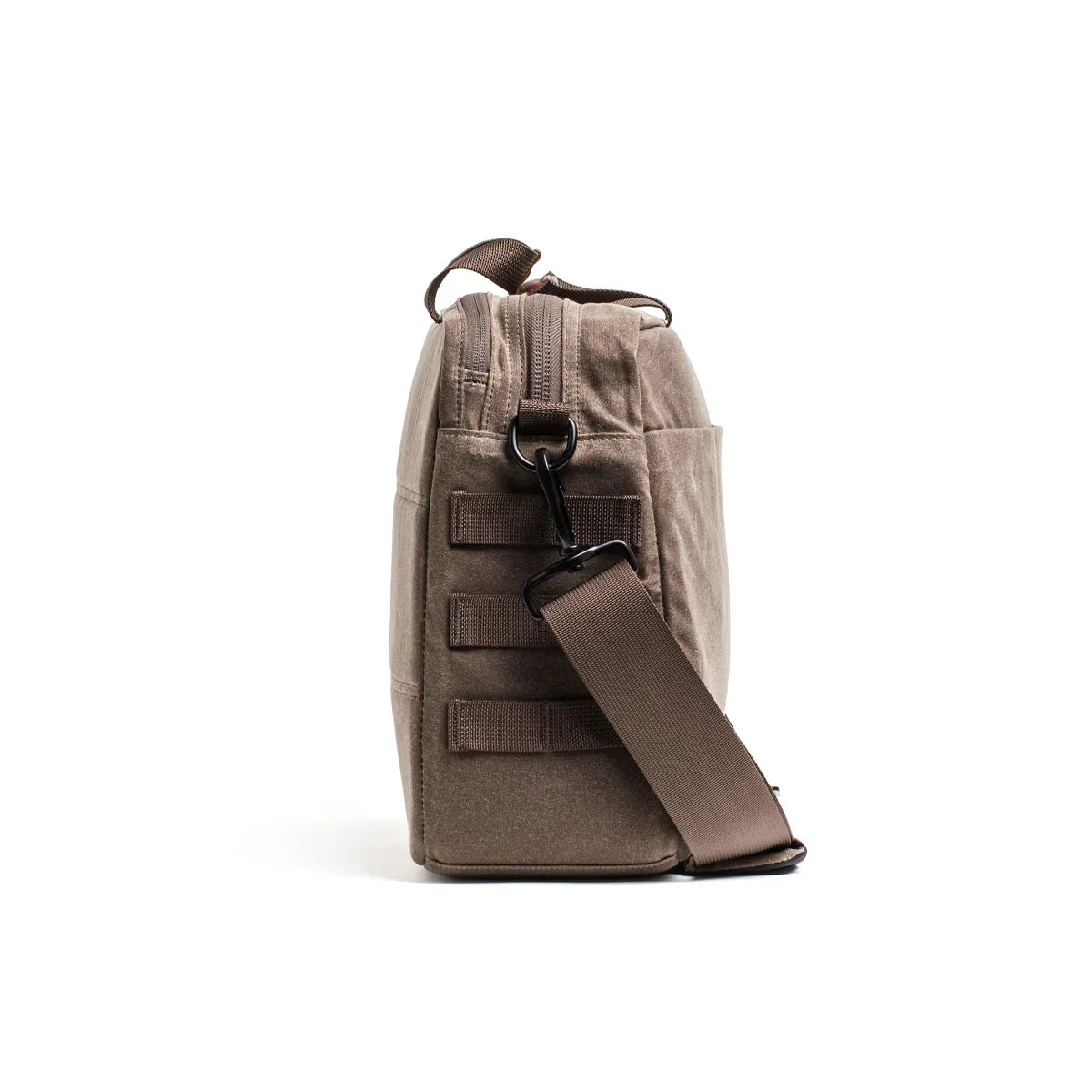 GORUCK dark oak waxed canvas shoulder bag side view with adjustable strap and MOLLE webbing