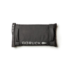A black Simple Training Sandbags with handles and "40" marked on the end lies on a white background—ideal for sandbag training or as versatile home gym equipment.