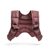 The Spy Ruck | Women's Weighted Vest features maroon padding, black strap accents, an adjustable buckle, and branded lining—perfect for training or pairing with GORUCK gear.