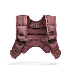 The Spy Ruck | Women's Weighted Vest features maroon padding, black strap accents, an adjustable buckle, and branded lining—perfect for training or pairing with GORUCK gear.