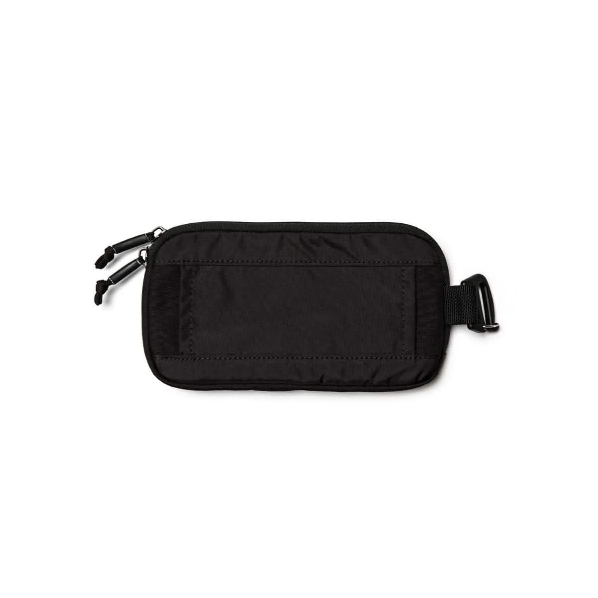 GORUCK black sternum strap pouch with dual zippers and buckle on white background