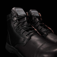 GORUCK black leather rucking boots with rugged laces on a black background