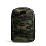 The GR1 USA - Heritage Woodland Camo M81 stands upright against a plain white background, featuring sturdy full-grain leather handles.