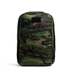 The GR1 USA - Heritage Woodland Camo M81 stands upright against a plain white background, featuring sturdy full-grain leather handles.