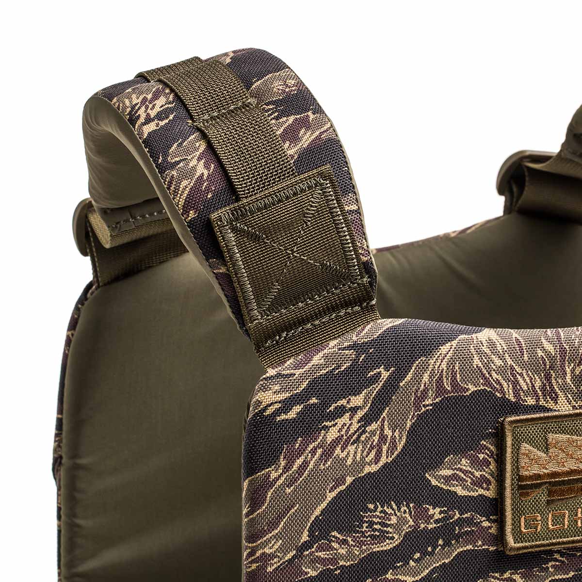 Close-up of the Training Weight Vest 2.0’s camouflage strap with detailed stitching and patch, ideal for ruck plates or as a training weight vest.