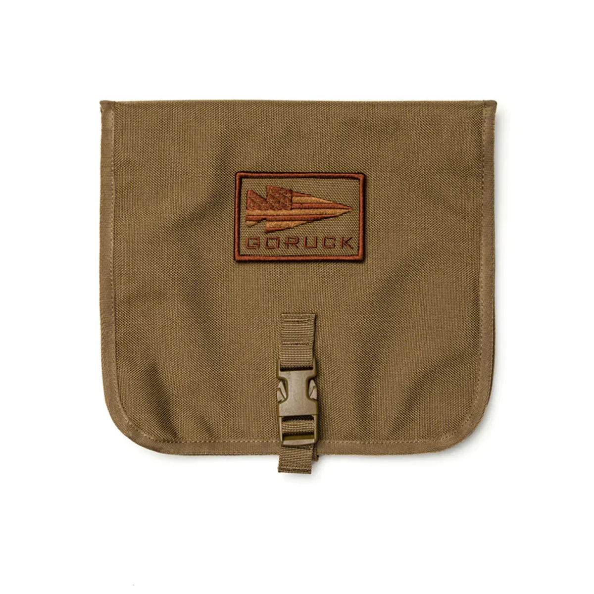 The brown Wire Dopp features a buckle closure and a rectangular patch with a spear and flag design, making it ideal for carrying your EDC essentials or using as a compact travel organizer.
