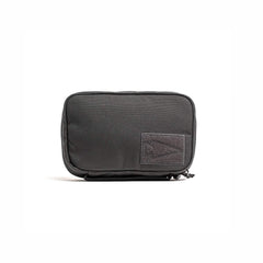 GORUCK black tactical pouch with front patch, durable rucking gear on white background