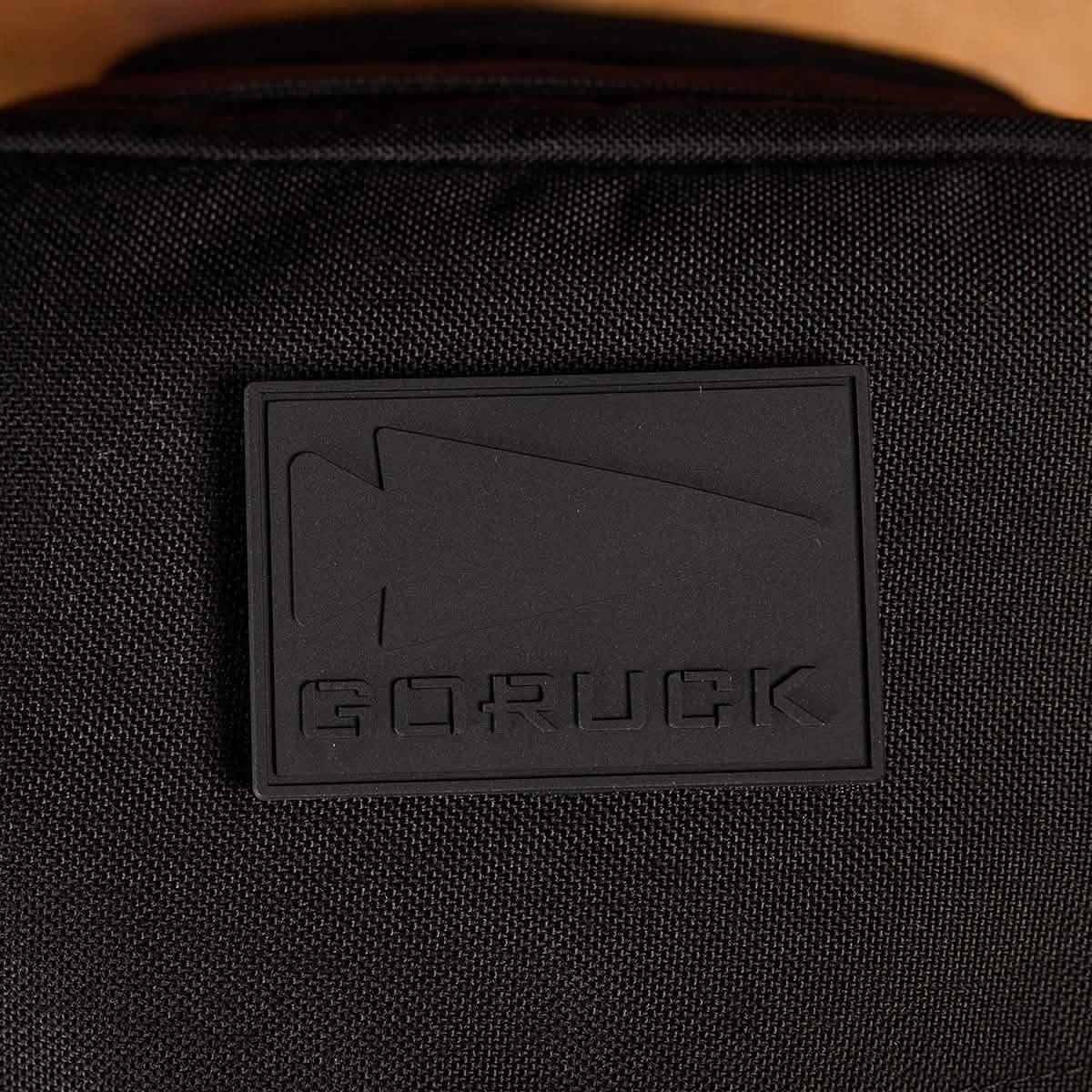 GORUCK black patch logo on rugged backpack fabric, durable rucking gear close-up