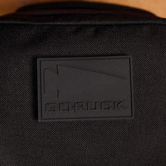 GORUCK black patch logo on rugged backpack fabric, durable rucking gear close-up