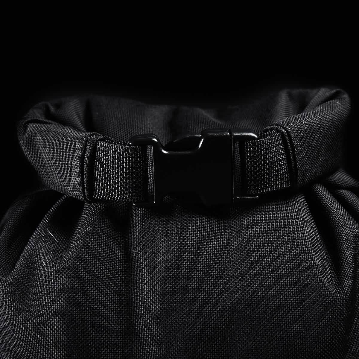 Close-up of black GORUCK rucking backpack buckle and durable fabric