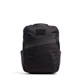 The KR1 2.0 - Kid Ruck is a black kids backpack with a diagonal front zipper, top handle, side pockets, and a simple rectangular shape—an indestructible school bag made for daily adventures. Add patches to make it yours!.