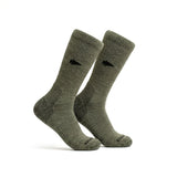 A pair of Merino Compression Socks in olive green, featuring a black arrow logo on each side, displayed on a white background.