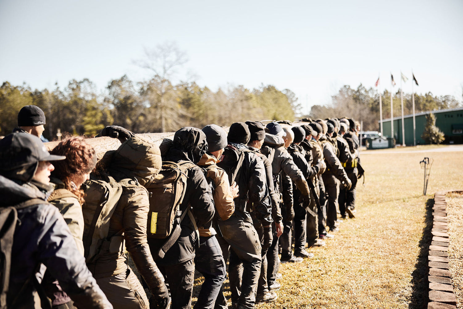 A group of people standing in a line.