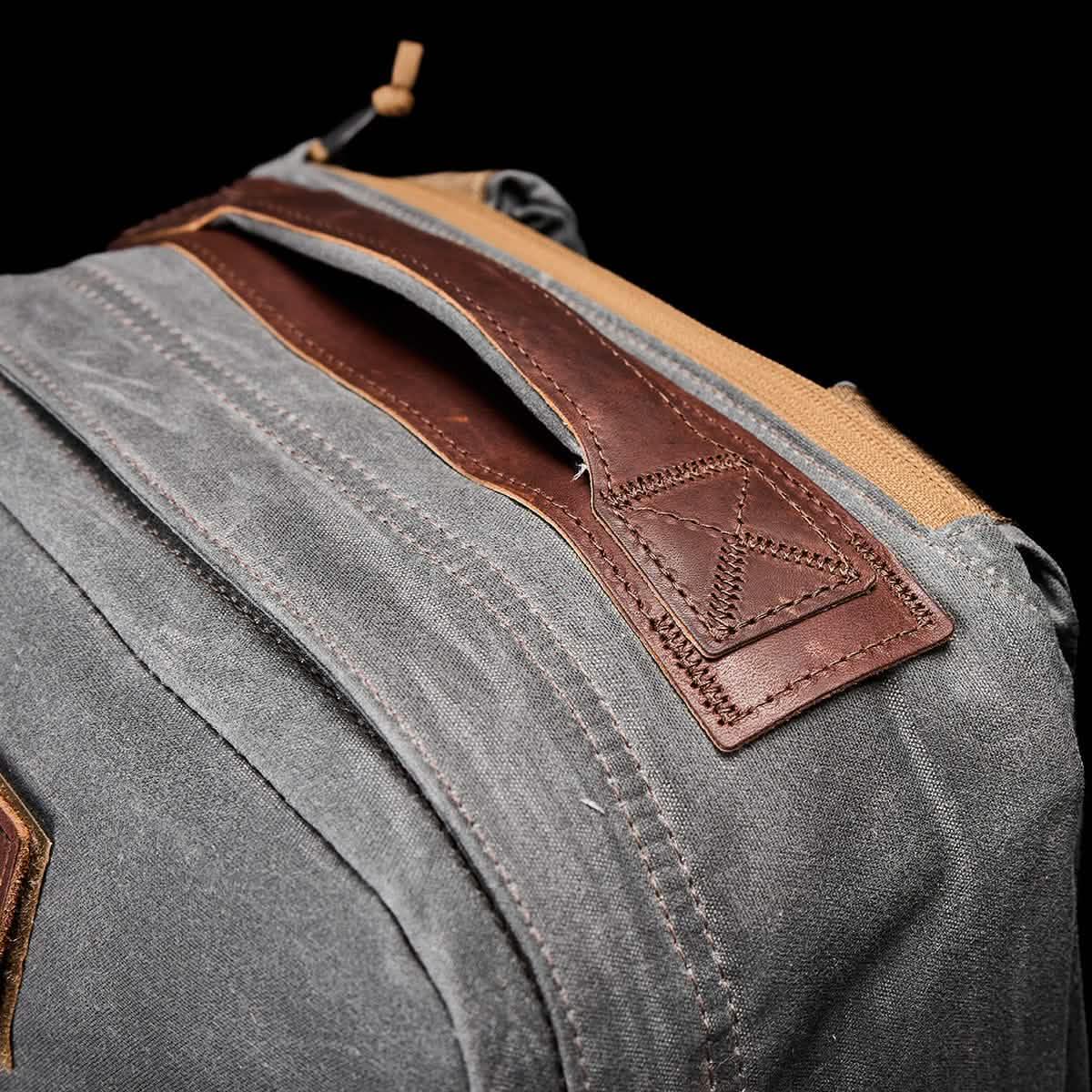 GORUCK Heritage Slate rucksack close-up showing sturdy leather handle and rugged stitching