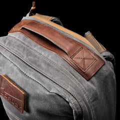 GORUCK slate gray rucksack with brown leather handle, rugged waxed canvas detail