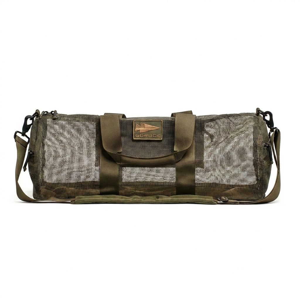 The Mesh Duffel Bag features breathable mesh, olive green straps, and a GORUCK logo patch—ideal for use as a dirty shoe bag or for carrying wet gear.