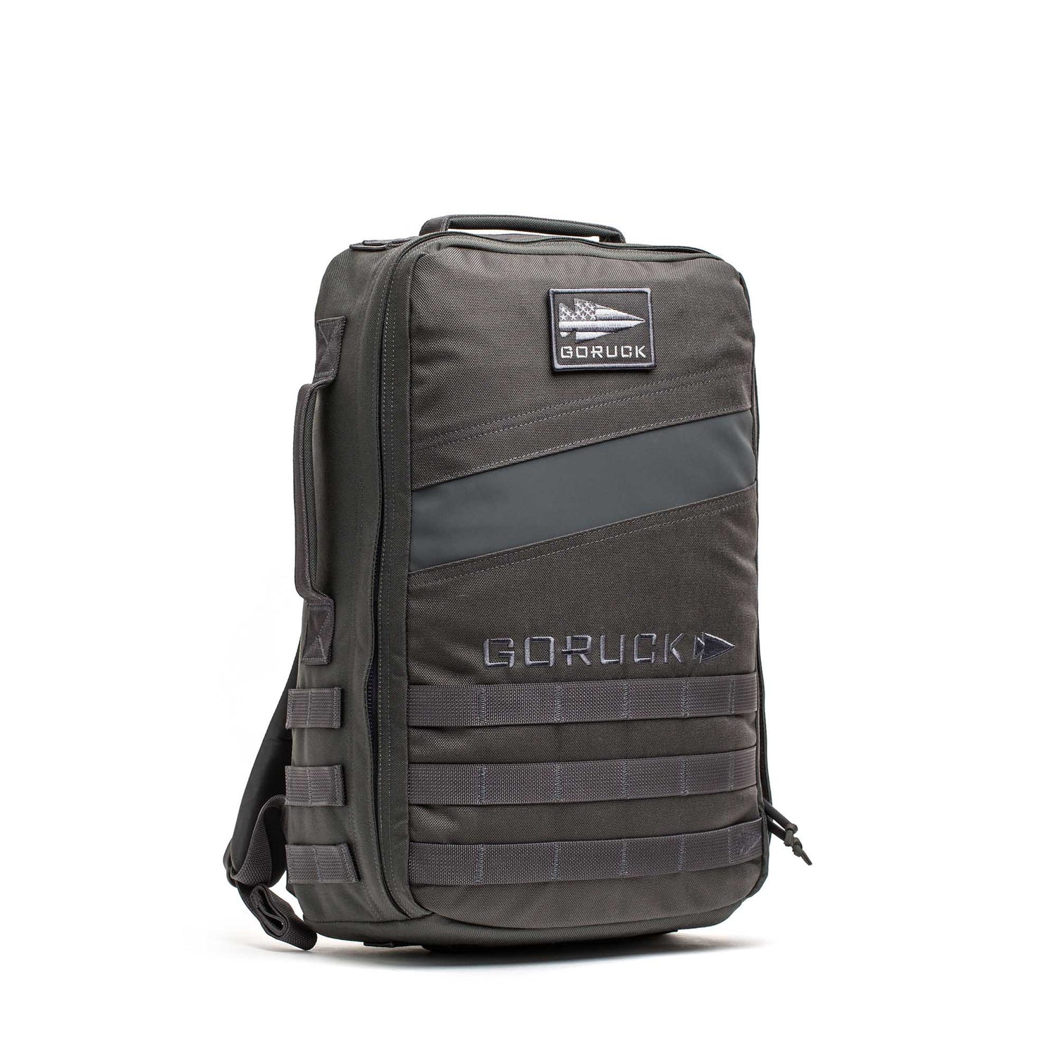 The Rucker 5.0 is a black tactical rucksack with MOLLE webbing, designed for rucking, compatible with ruck plates, and features a GORUCK patch on the front.