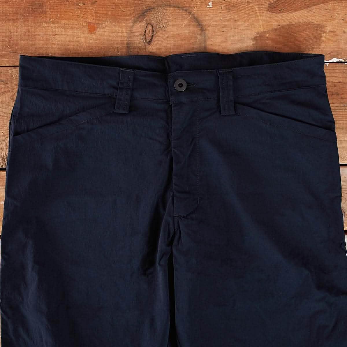 GORUCK simple black pants front detail on wooden background