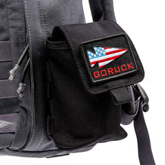 GORUCK side pocket pouch attached to rucksack with American flag logo patch