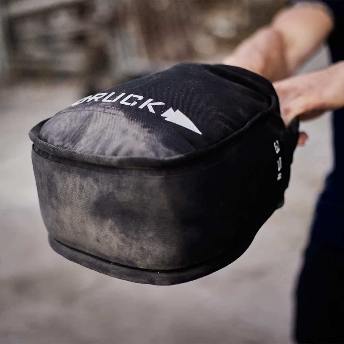 GORUCK sandbag in use, showing durable black rucking gear outdoors