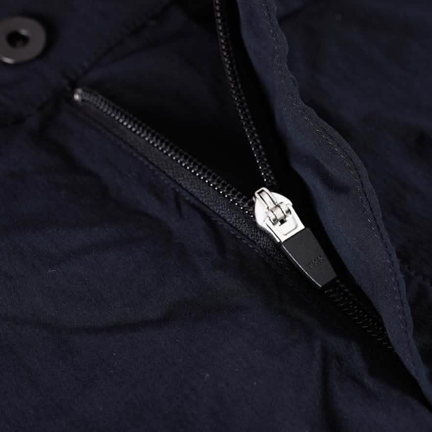 Close-up of durable black zipper on GORUCK rucking gear jacket