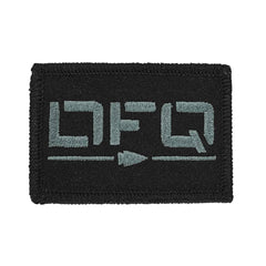 GORUCK black embroidered patch with stylized grey lettering and arrow design