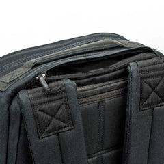GORUCK tough black rucking backpack close-up showing shoulder straps and top zipper pocket