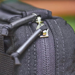 Close-up of GORUCK black rucksack zipper with durable field zipper pull