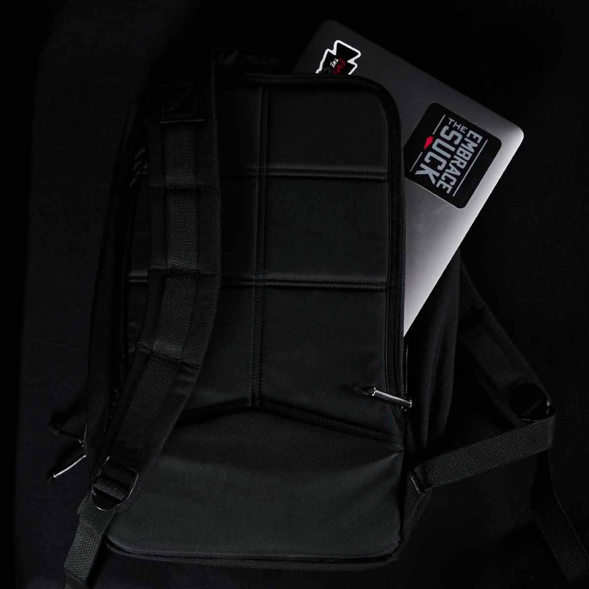 GORUCK black rucksack with laptop in padded compartment on dark background