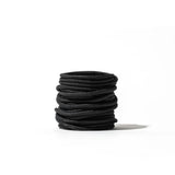 GORUCK black speed laces coiled on white background, rugged rucking shoe accessory