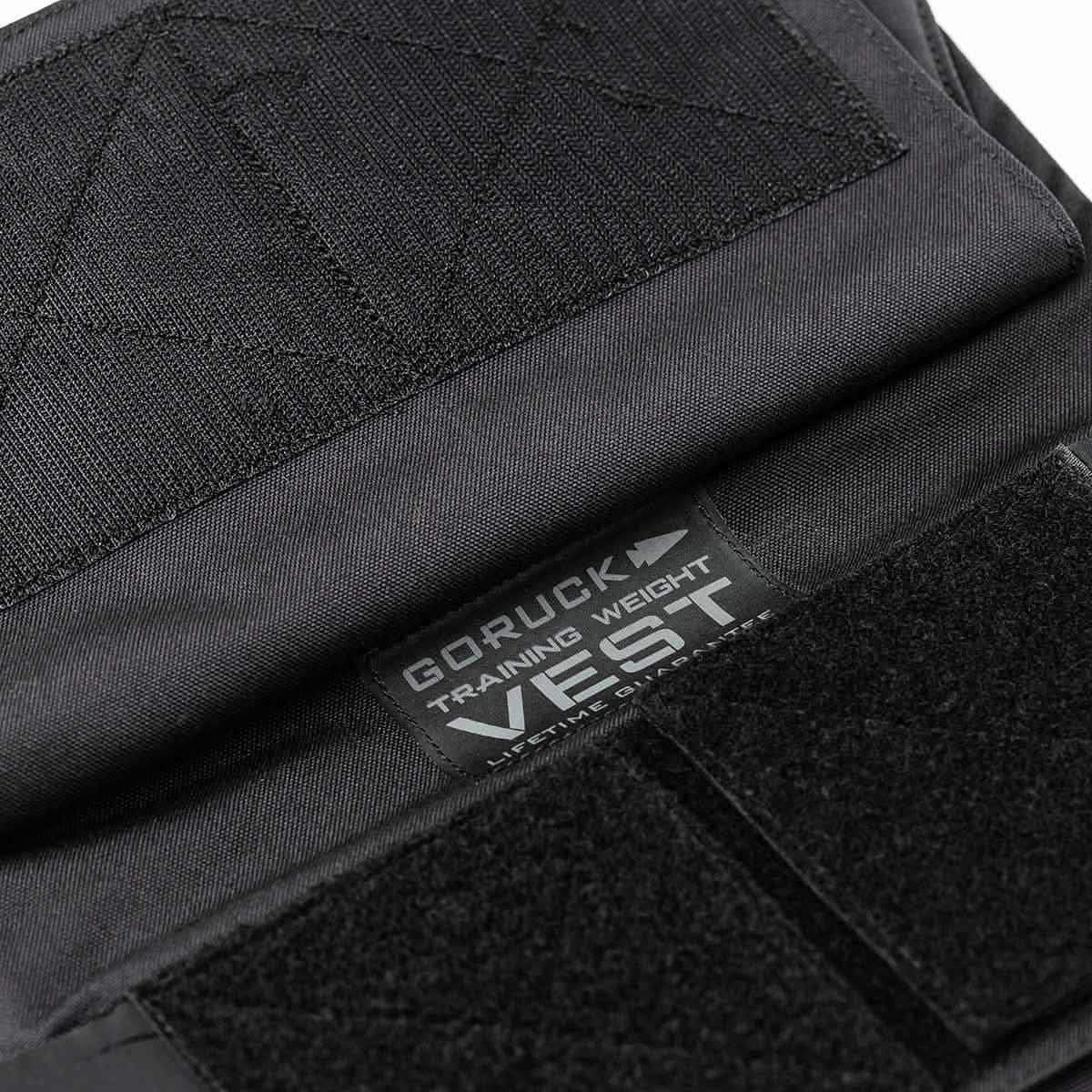 A close up of the Training Weight Vest - Black, featuring an adjustable design.