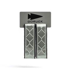 GORUCK reflective gear straps with diamond pattern on branded packaging, rucking accessory